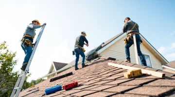 Local roofers near me inspecting a residential roof, showcasing professional services in action.